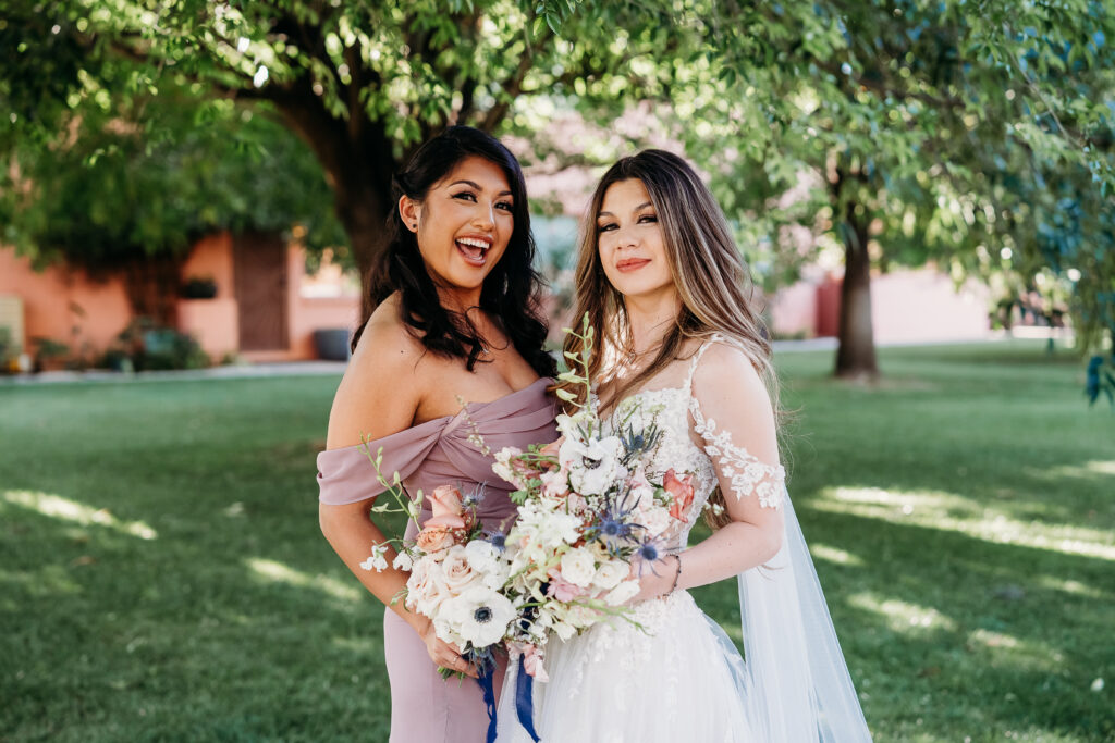 wedding gown with long veil, coronado house in phoenix, bride and bridesmaid poses