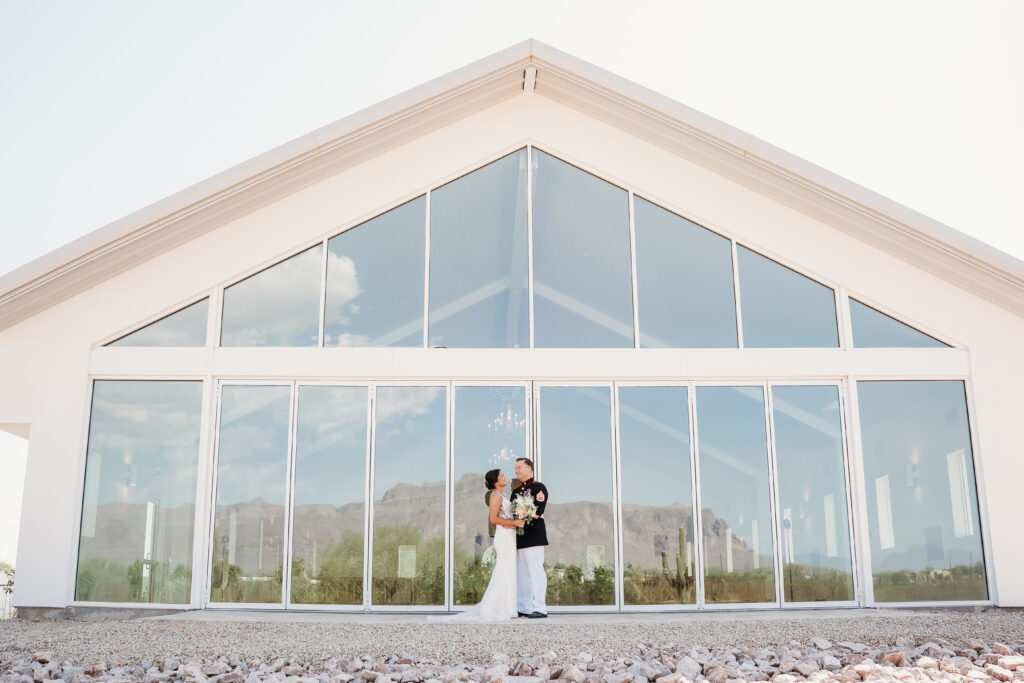 bride and groom formal photos, groom in navy uniform, military wedding, white and pink rose bouquet, Desert View Weddings & Events