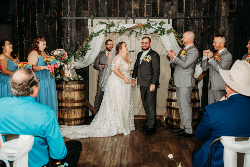 Fire House event center wedding ceremony bride and groom