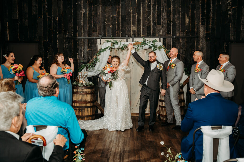 Fire House event center wedding ceremony bride and groom