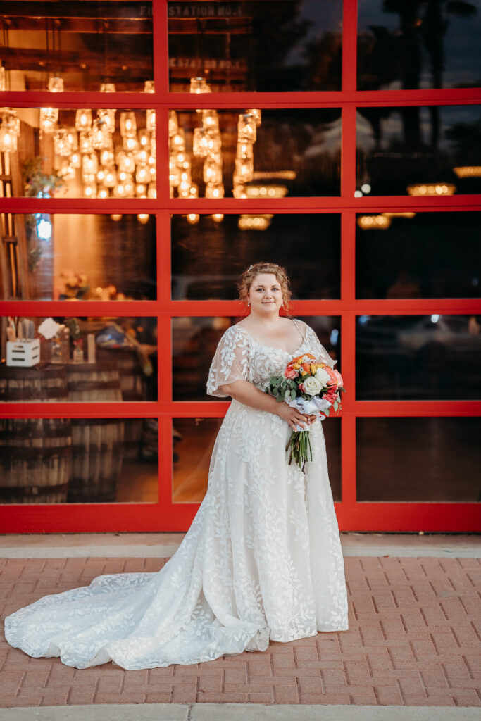 Fire House Event Center, bride posing ideas, bride in long leaf detailed dress, romantic wedding dress