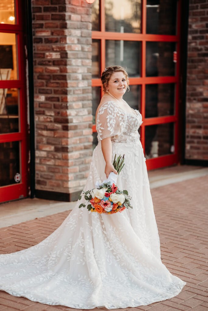 Fire House Event Center, bride posing ideas, bride in long leaf detailed dress, romantic wedding dress