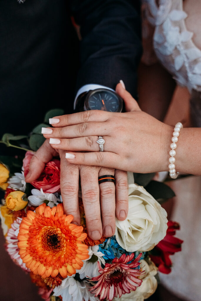 wedding details, bright flower bouquets, pear shaped diamond ring