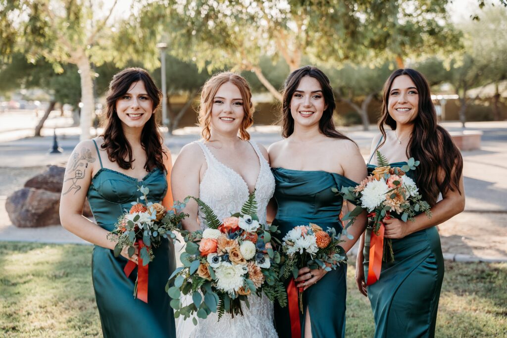 bride and bridesmaid posing ideas, bridesmaids in deep green long dress, arizona wedding photographer