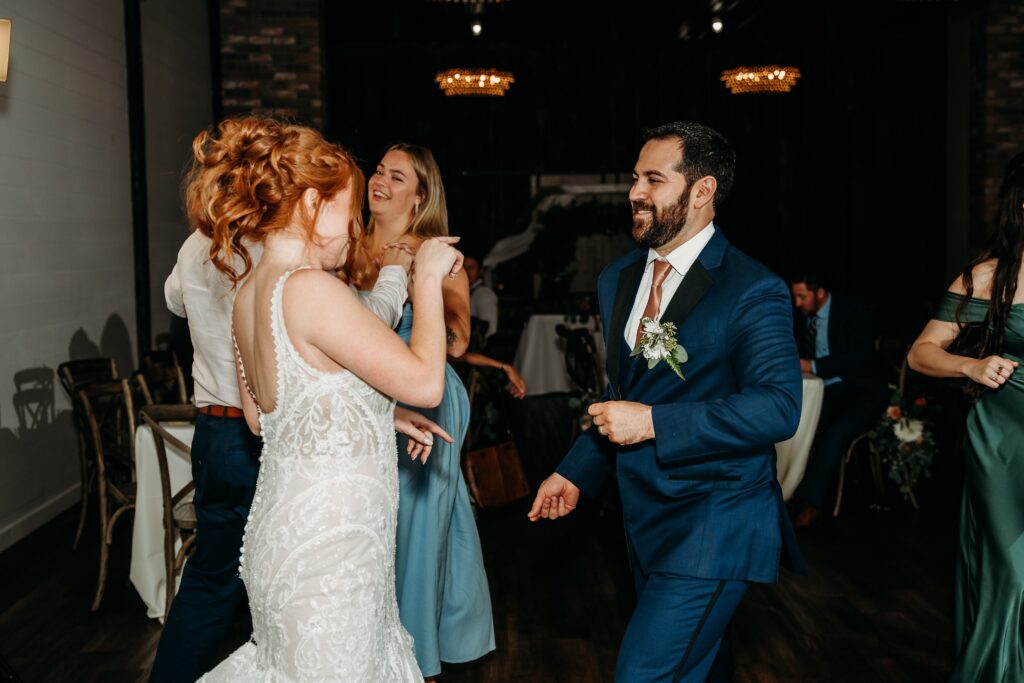 fire house event center reception, guest dancing