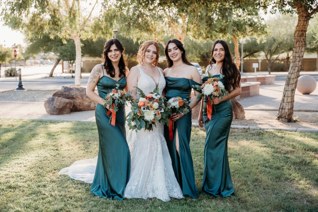bride and bridesmaid posing ideas, bridesmaids in deep green long dress, arizona wedding photographer