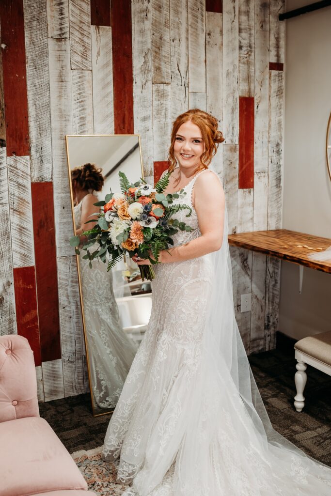 Bride getting ready at fire house even center