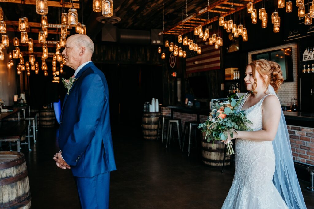 bride with father first look