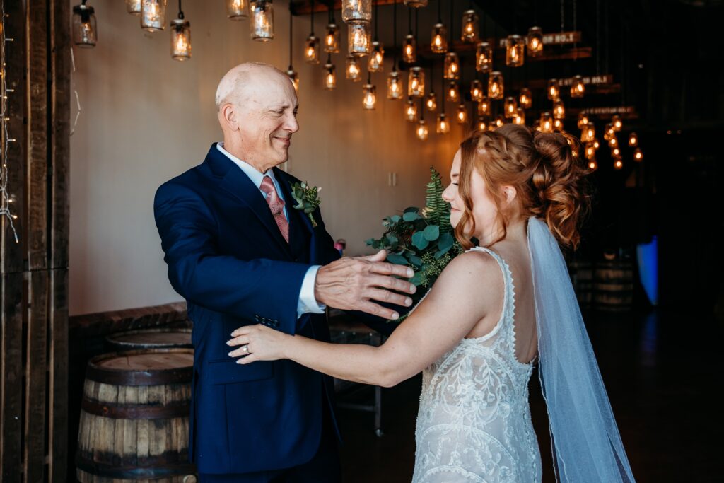 bride with father first look