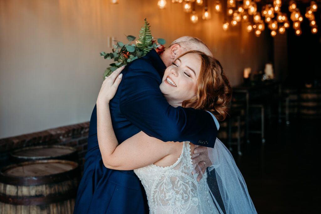 bride with father first look