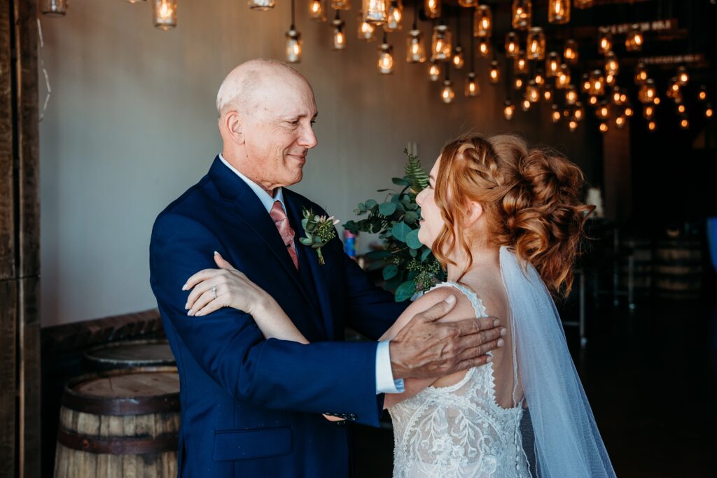 bride with father first look