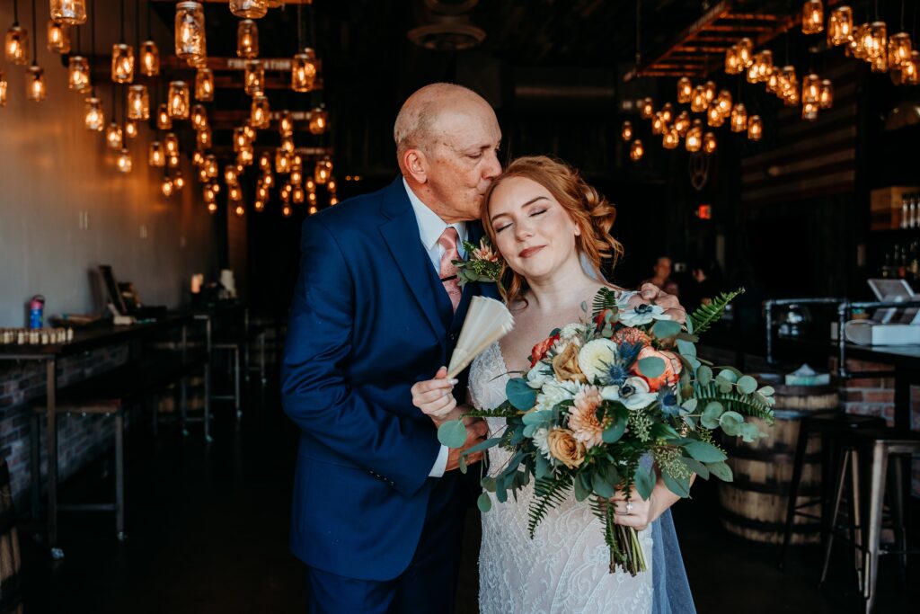 bride with father first look