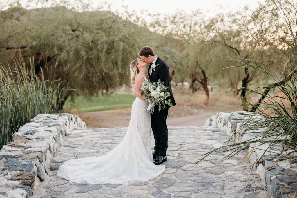 Bride and Groom Posing Ideas, bride and groom on stone bridge, bride and groom dessert wedding, verrado golf club wedding, arizona wedding photographer