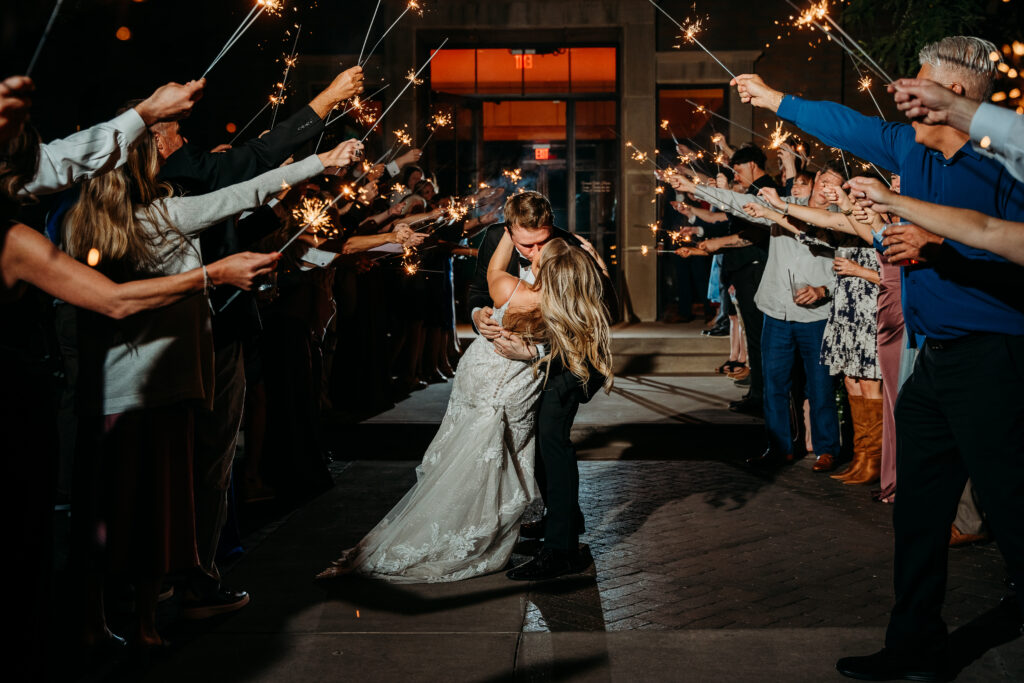 Bride and groom sparker exit, groom dipping bride during exit, verrado golf club