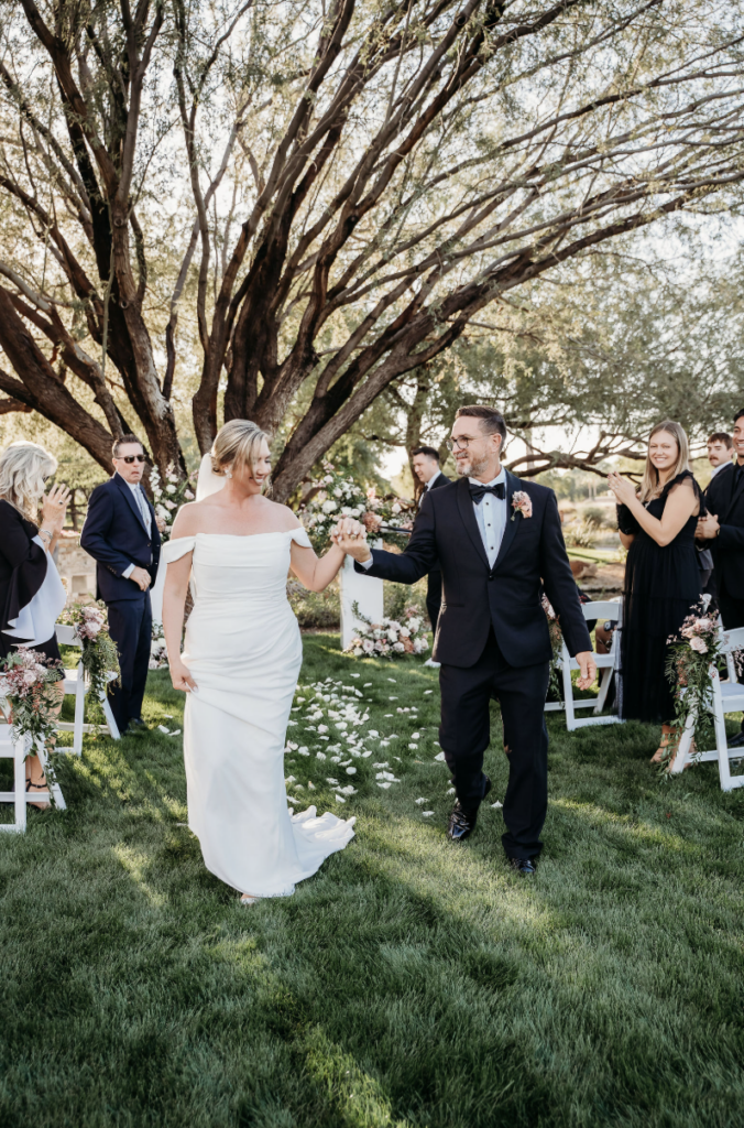 Intimate Arizona wedding celebration with the couple surrounded by their closest family and friends.