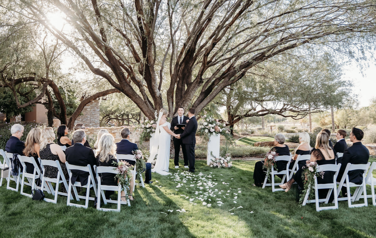 Intimate Arizona wedding celebration with the couple surrounded by their closest family and friends.